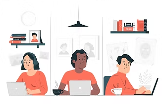 Three people working at laptops in a shared studio